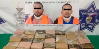 Detienen a dos con 70 libras de marihuana, arma y cartuchos